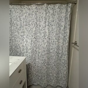 Organic cotton flowered shower curtain.